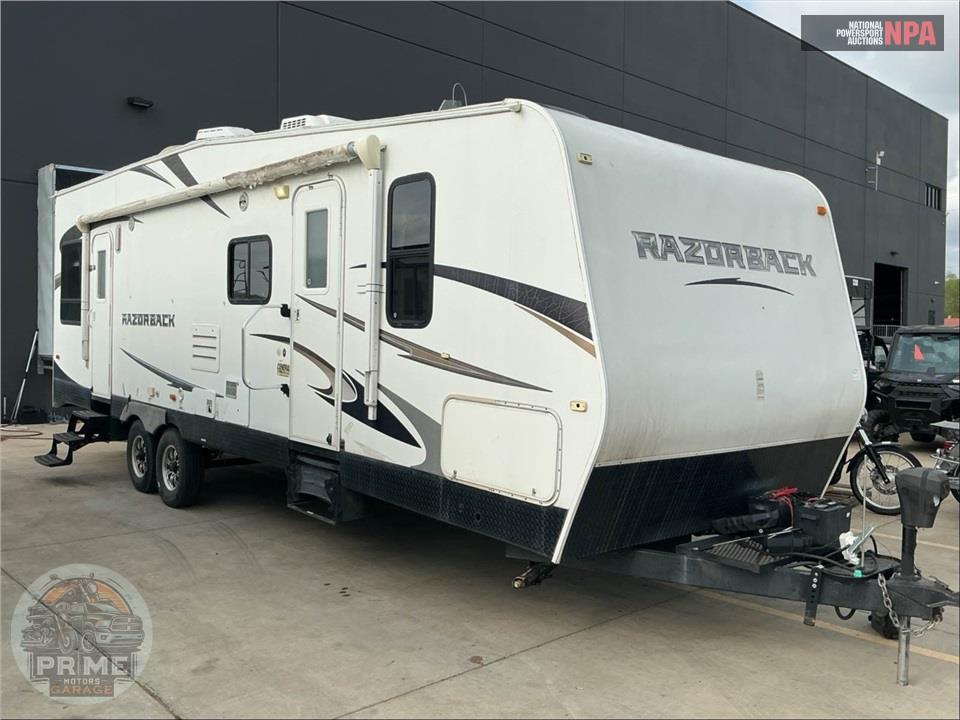 2013 Razorback By Dutchmen M-2950 - TOY HAULER SERIES — фото 1