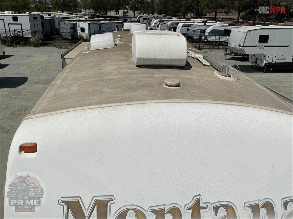 2011 Keystone Rv M-3400 RL - MONTANA HICKORY FIFTH WHEEL SERIES — фото 38
