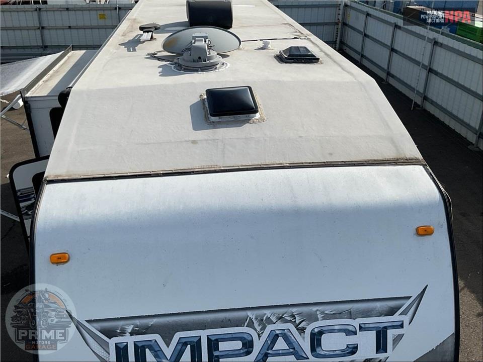 2015 Keystone Rv M-303 - IMPACT TOY HAULER SERIES — фото 41