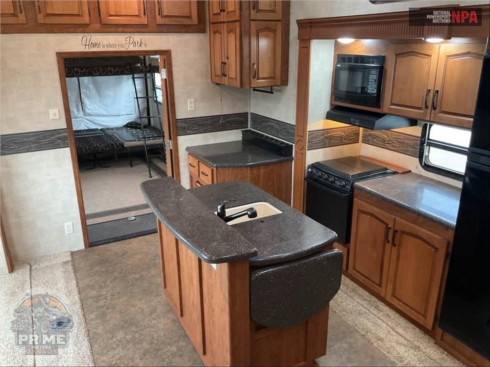 2011 Keystone Rv M-4014 LEV - RAPTOR TOY HAULER TOY HAULER SERIES — фото 6