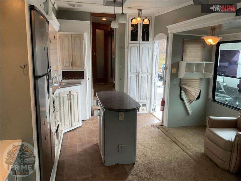 2010 Keystone Rv M-3640 RL - ALPINE FIFTH WHEEL SERIES — фото 8