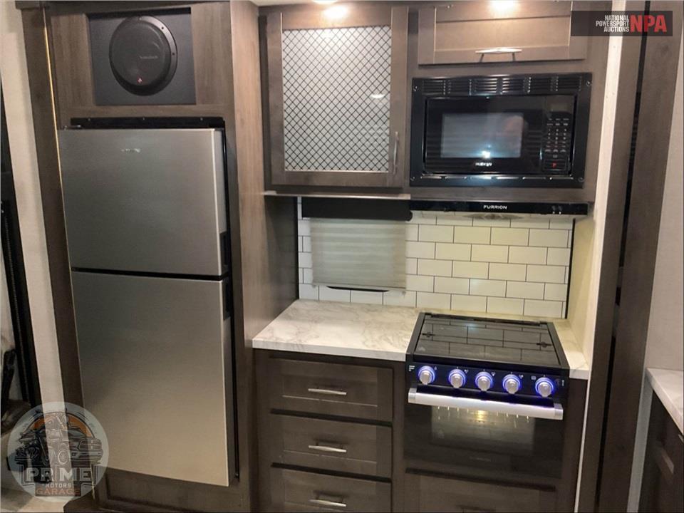 2022 Grand Design Recreational Vehicles M-25G MOMENTUM G-CLASS TOY HAULER SERIES — фото 20