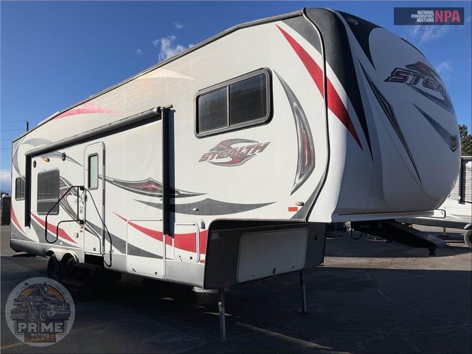 2015 Forest River-California/Oregon M-2812G - STEALTH TOY HAULER TOY HAULER SERIES — фото 1