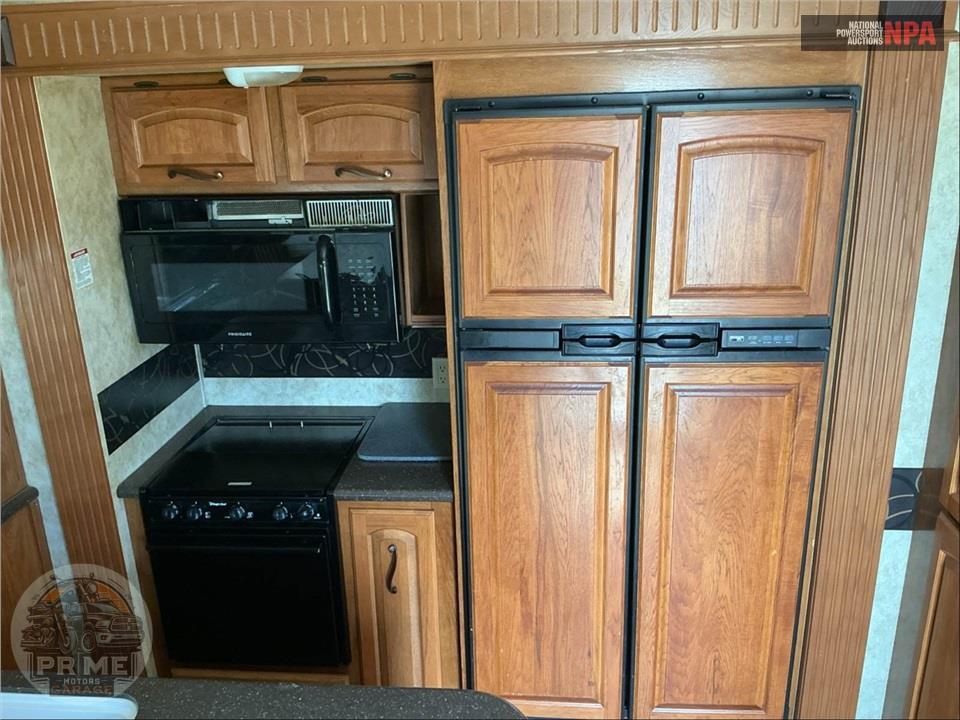 2011 Keystone Rv M-3400 RL - MONTANA HICKORY FIFTH WHEEL SERIES — фото 19