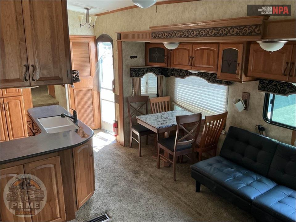 2011 Keystone Rv M-3400 RL - MONTANA HICKORY FIFTH WHEEL SERIES — фото 9