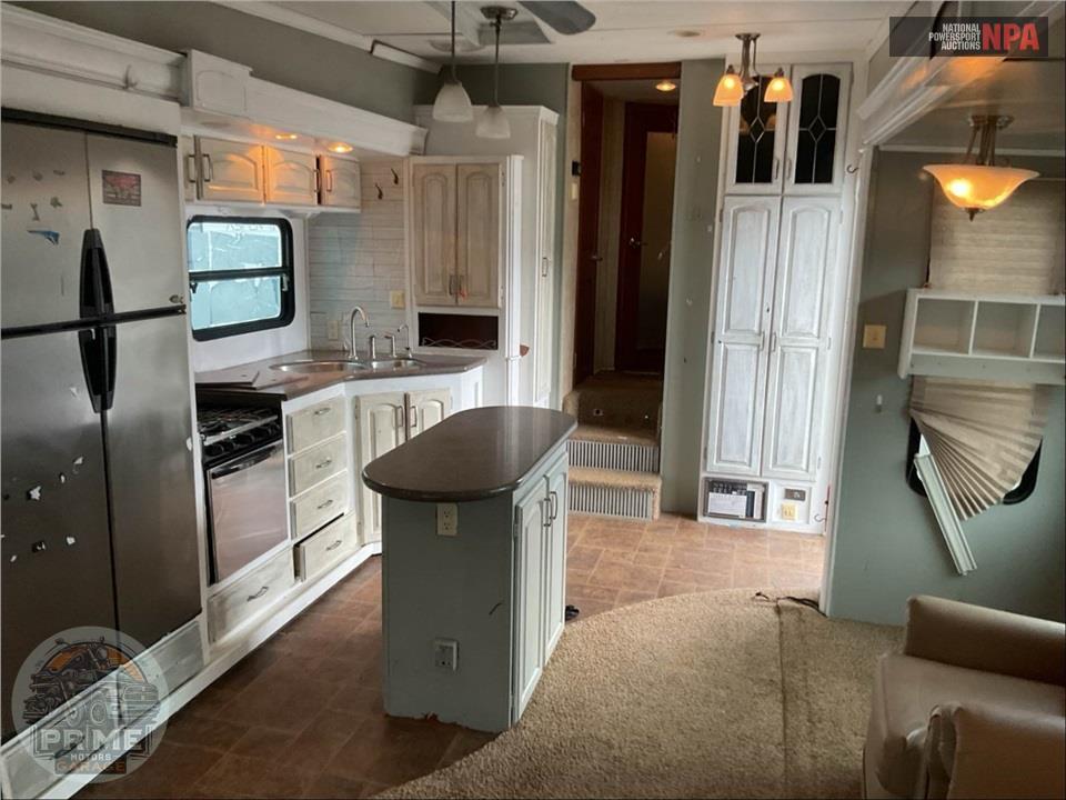 2010 Keystone Rv M-3640 RL - ALPINE FIFTH WHEEL SERIES — фото 9