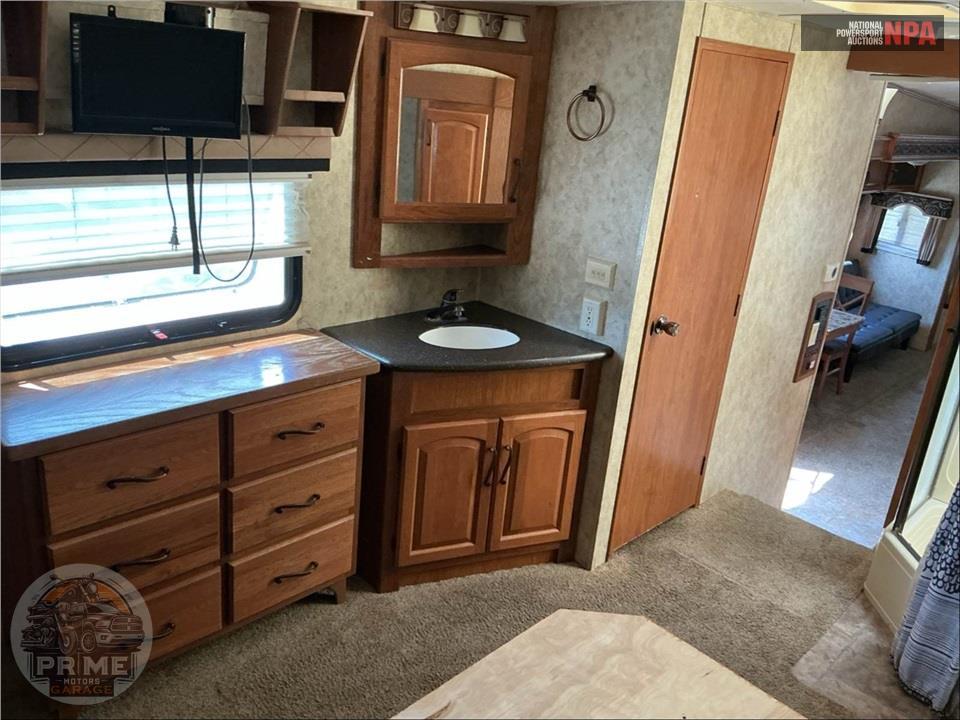 2011 Keystone Rv M-3400 RL - MONTANA HICKORY FIFTH WHEEL SERIES — фото 13