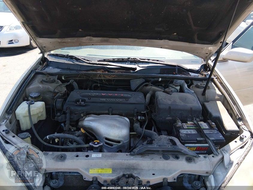 2004 TOYOTA CAMRY LE — фото 10