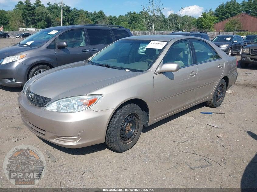 2004 TOYOTA CAMRY LE — фото 2
