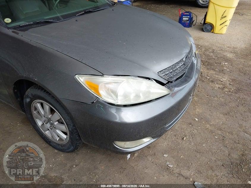 2004 TOYOTA CAMRY XLE — фото 12
