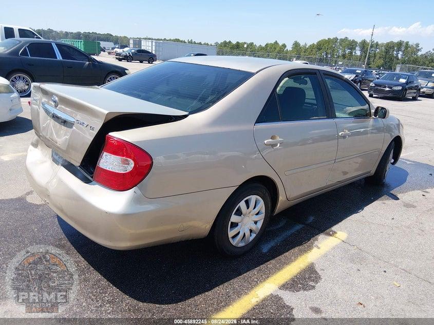 2004 TOYOTA CAMRY LE — фото 4