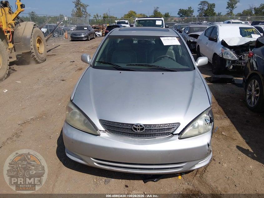 2004 TOYOTA CAMRY XLE — фото 12