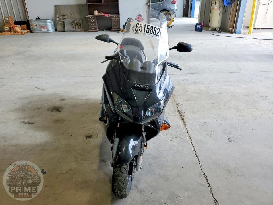 2004 HONDA NSS250 — фото 2