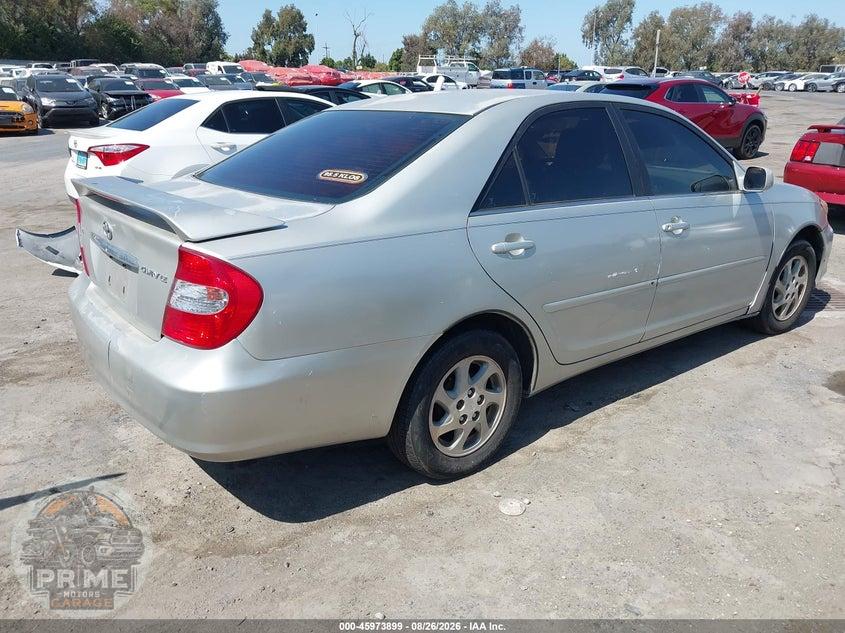 2002 TOYOTA CAMRY LE — фото 4