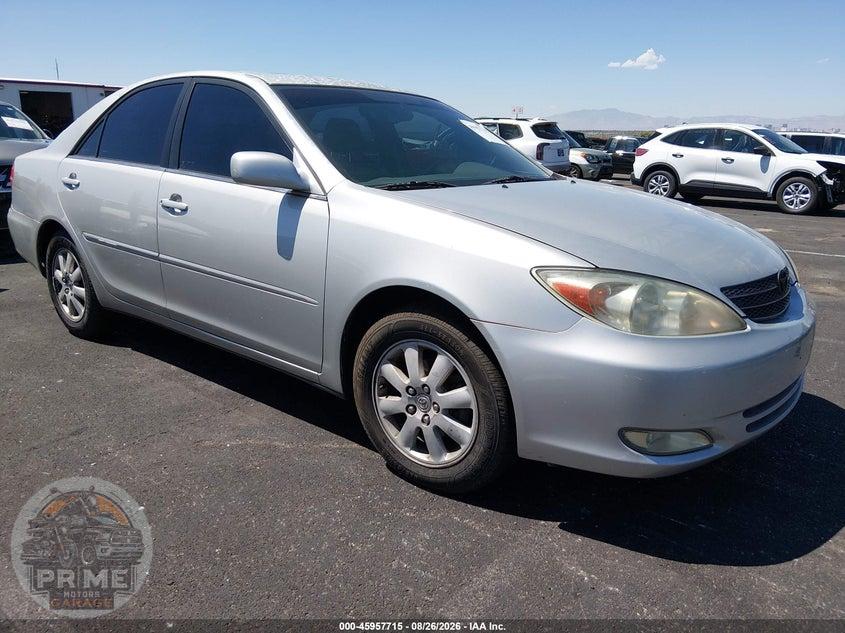 2003 TOYOTA CAMRY XLE — фото 1